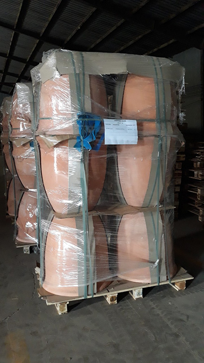 Pots loaded on pallet, covered by plastic film and fastened by strings